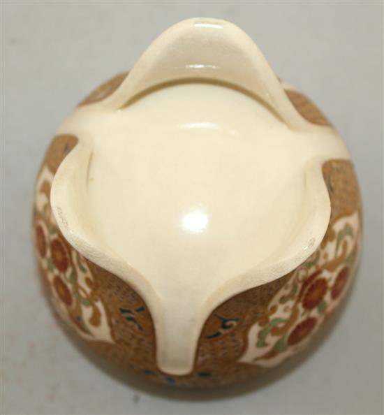 A Japanese Satsuma pottery tripod koro and a similar baluster vase, Meiji period, 13cm. (2)